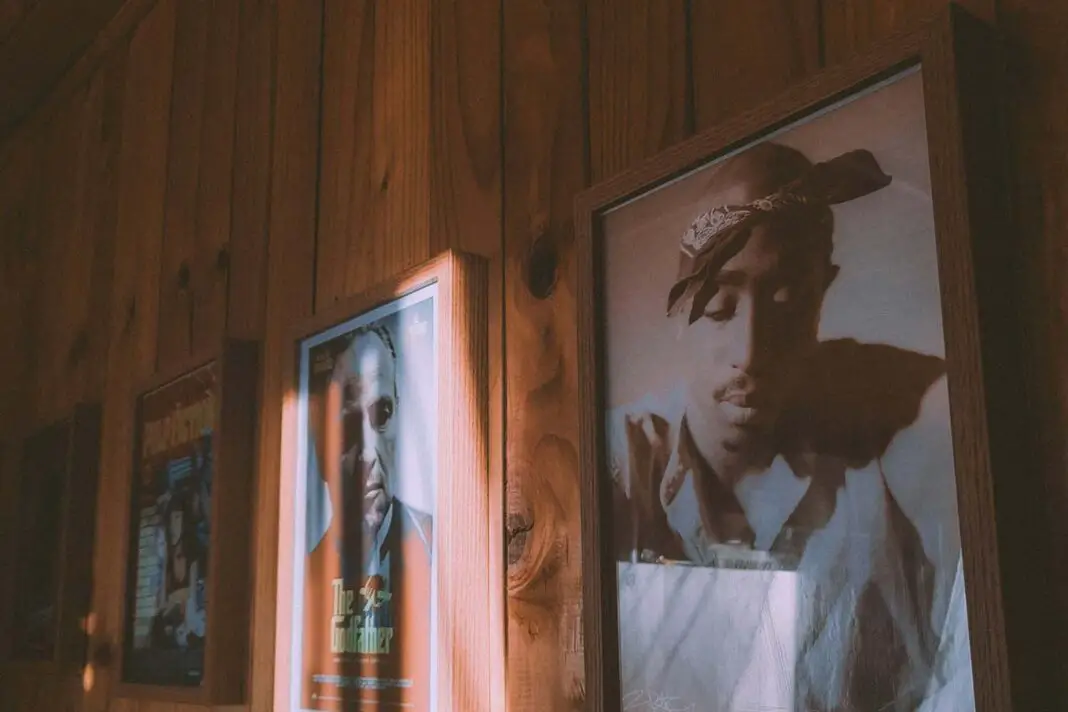 Tupac's artwork on a wall by Rodrigo Ulloa Unsplash